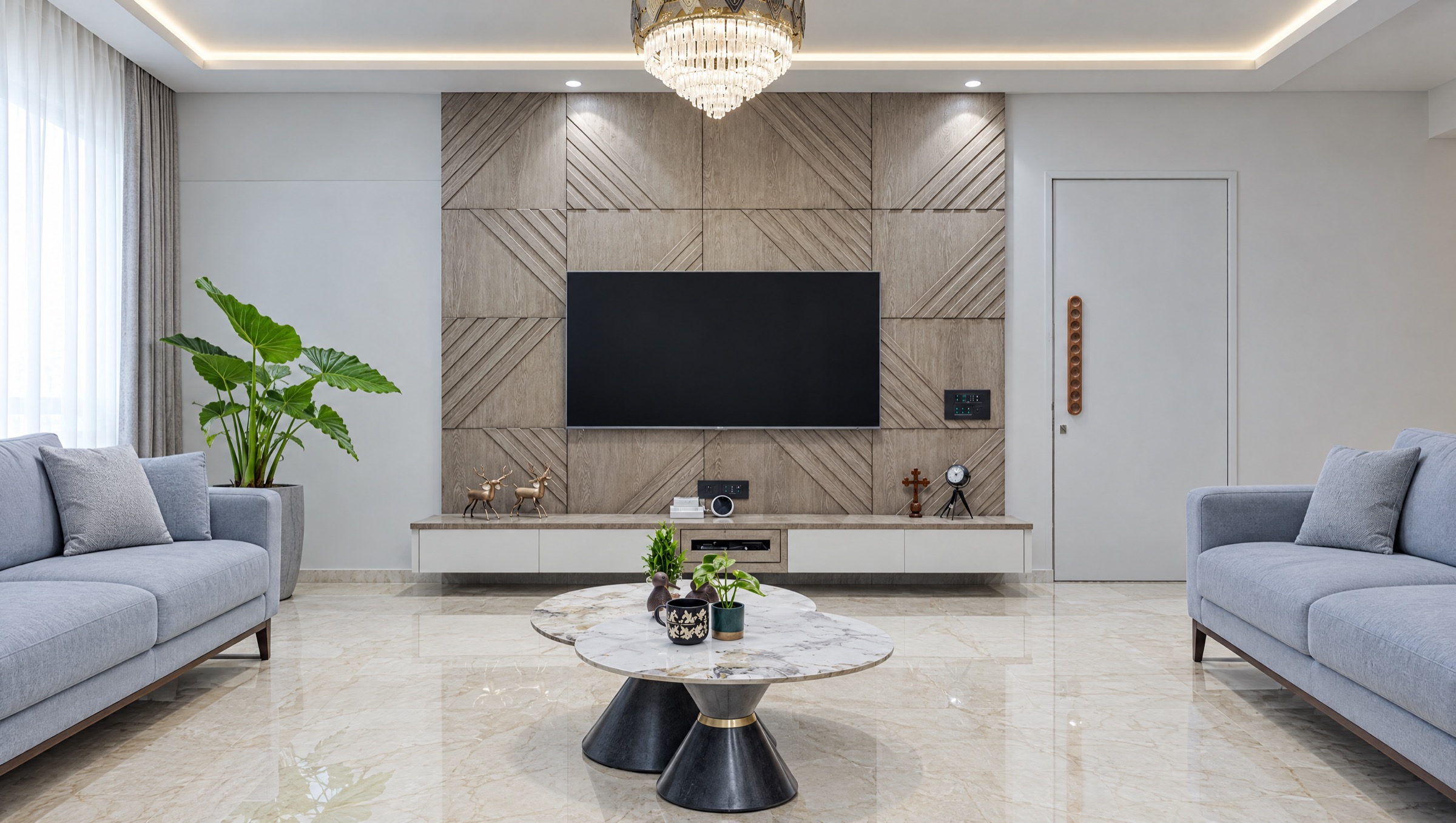 Living room with a fluted oak feature wall and a crystal chandelier